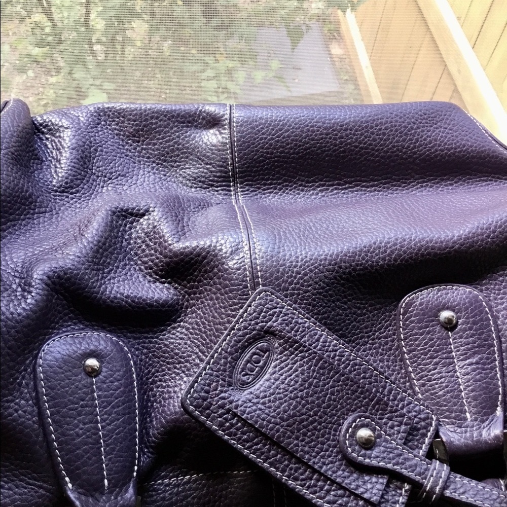 Tods dark purple/eggplant purse. Color like first picture.
